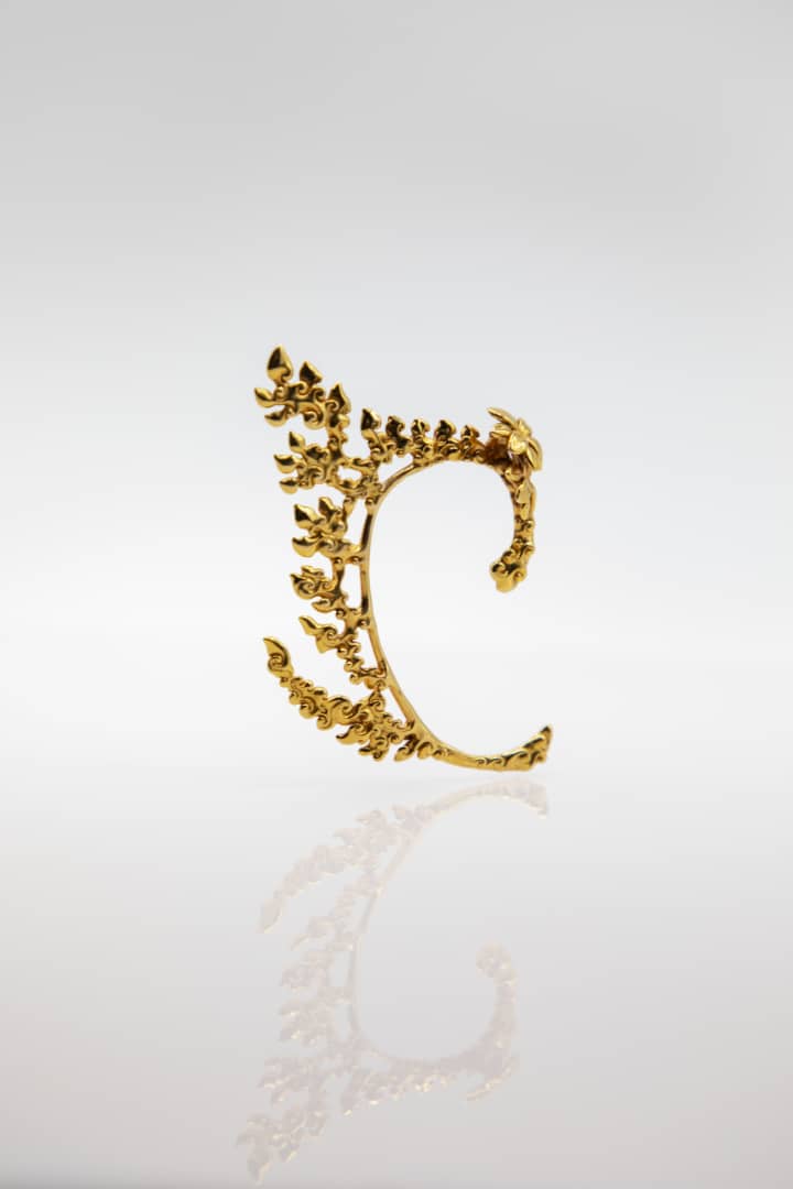 Neang Neak Ear Cuff in 18kt Yellow Gold. Image Courtesy of EdoEyen