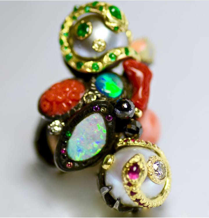 Serpentine Ring: Pearls, Opals, Emeralds, Rubies, Purple and Black Diamonds, Ebony. Image Courtesy of Castro NYC