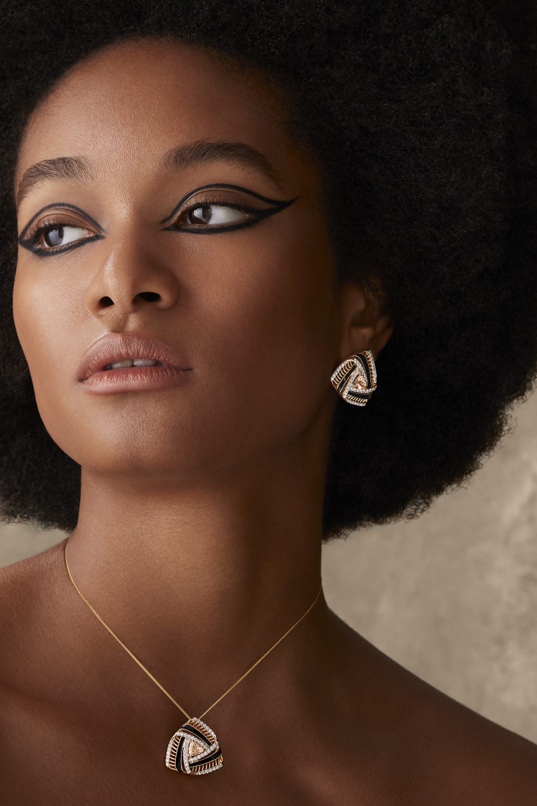Bayuda Earrings and Pendant: 18ct yellow gold, morganite, diamonds and enamel. Image Courtesy of Matturi Jewellery