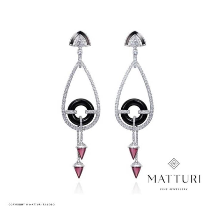 Kandake Earrings, 18 kt white gold, diamonds, rhodolites, black onyx, enamel. Image Courtesy of Matturi Jewellery