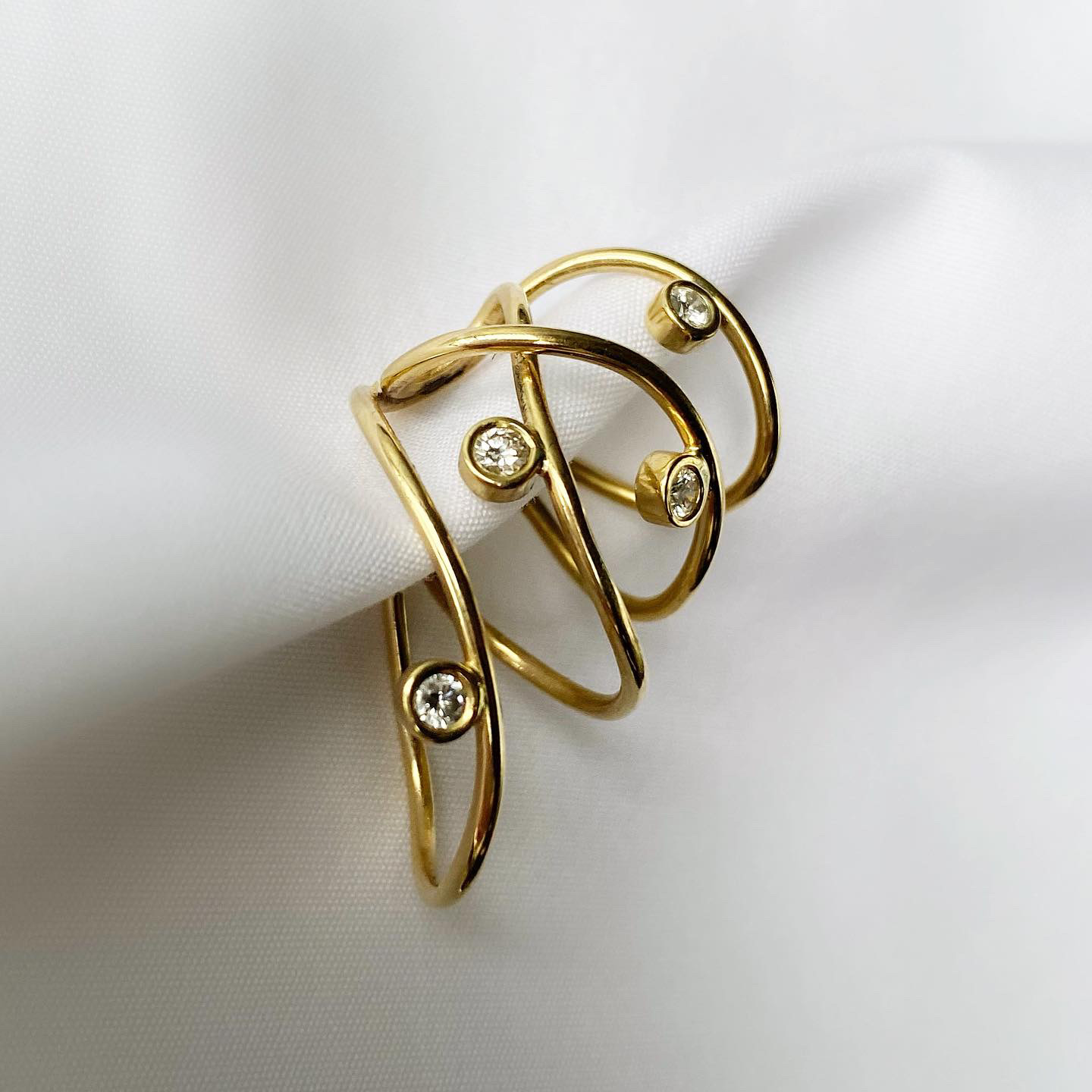 Bespoke Mimma Ear Cuff in 18kt Yellow Gold and Diamonds. Image Courtesy of S Faurschou
