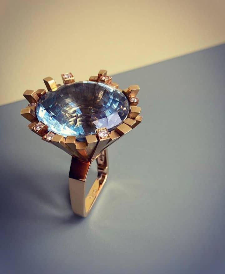 Blue Topaz, Yellow Gold and Diamond Ring by Andrew Grima. Image Courtesy of F. Grima