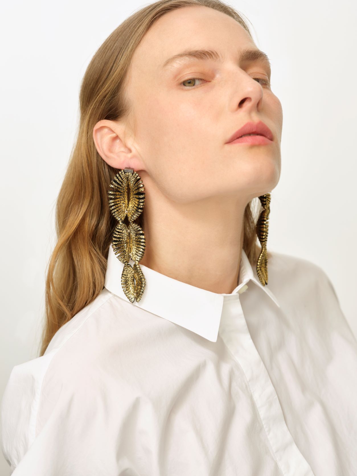 Loie Earrings in Gold Leather, Image courtesy of So=Le Studio