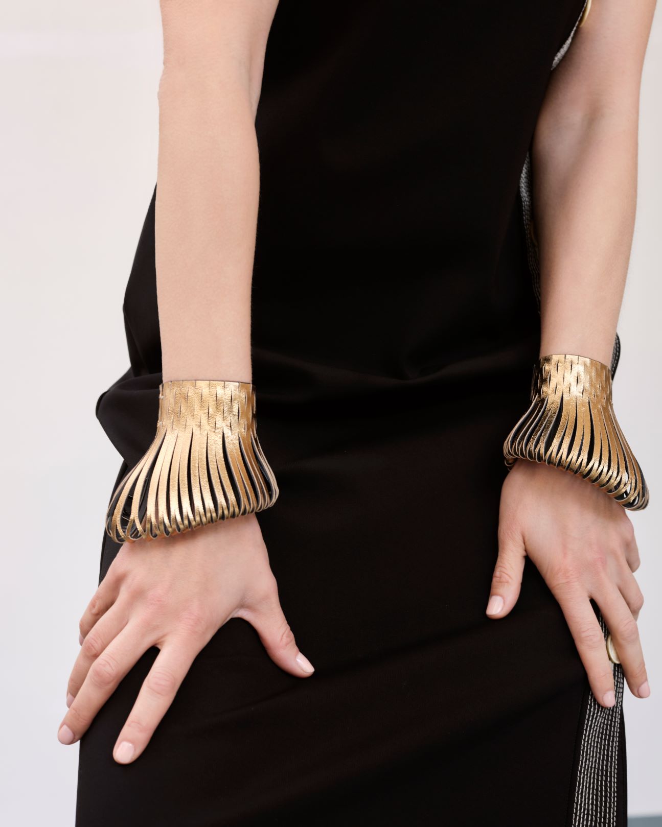 Lolita Cuffs in Gold Leather. Image Courtesy of So-Le Studio