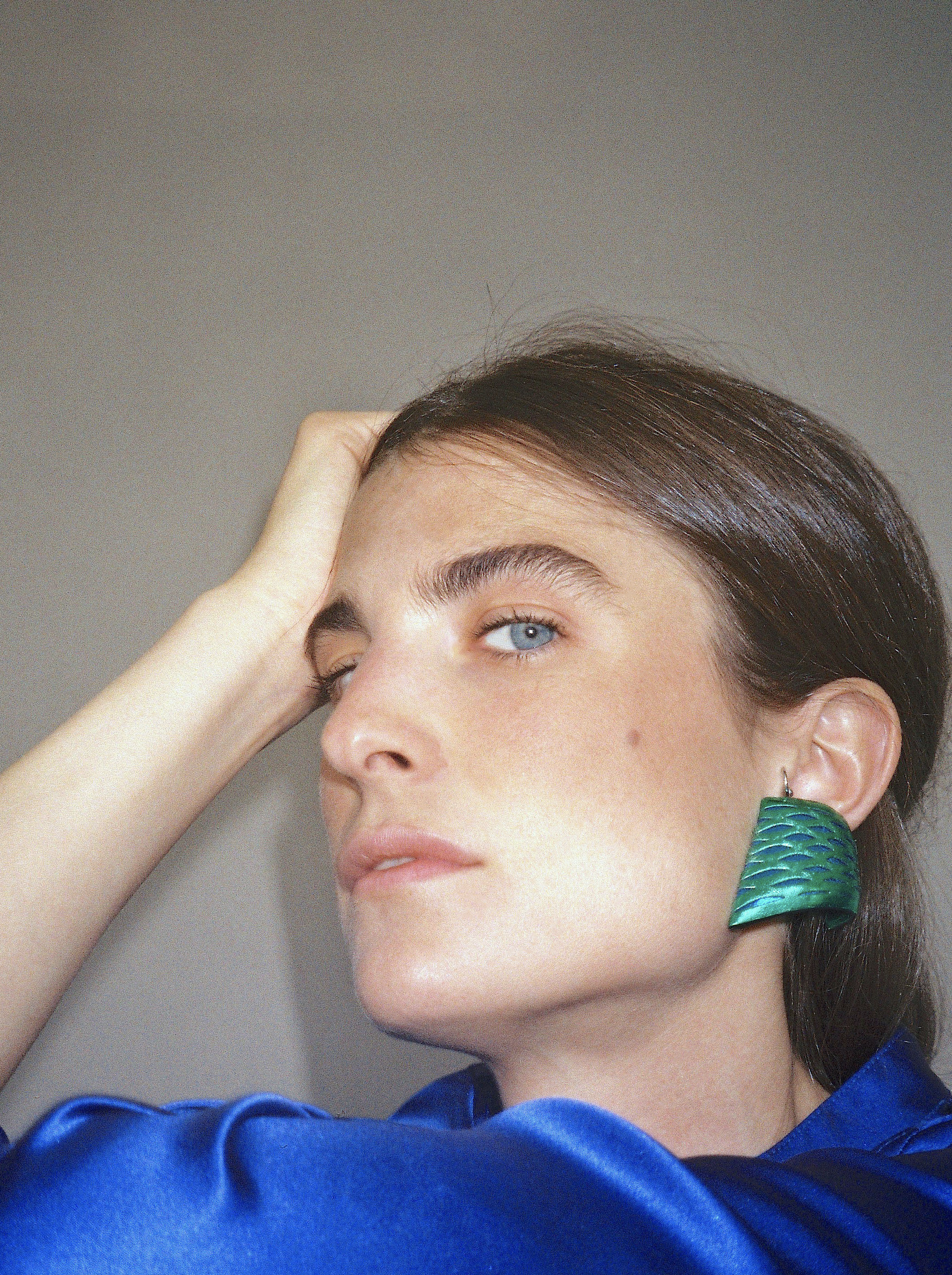 The Vessel Ear Clips In Green Leather. Image Courtesy of So-Le Studio